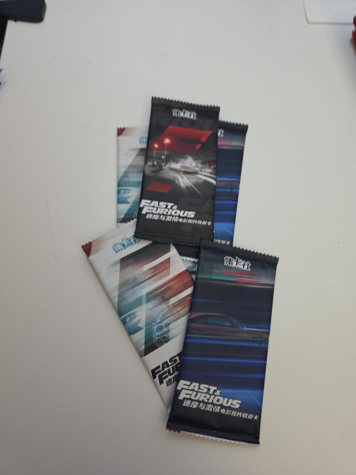 Five Card.Fun Fast & Furious sealed trading card packs in assorted wrapper designs