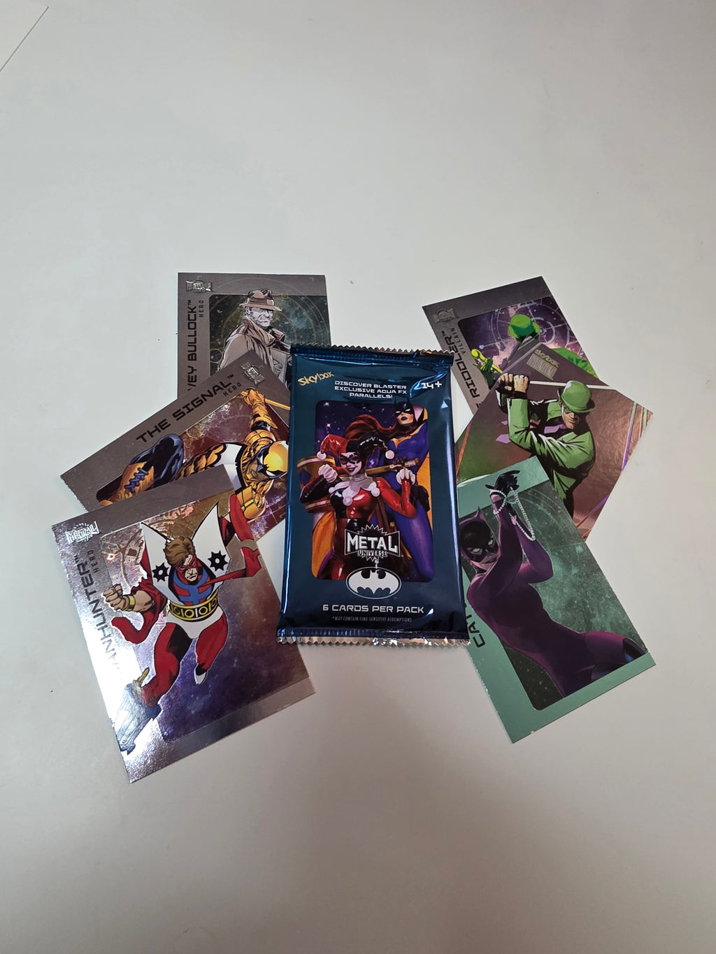 SINGLE PACK - 2025 SkyBox Metal Universe Batman Blaster – 6 Cards – Aqua FX Chase